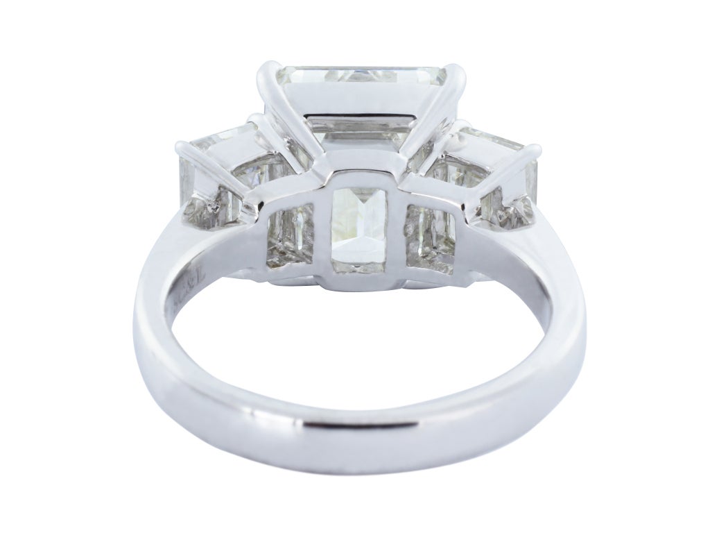 GIA Certified 5.05 Carat Emerald Cut Diamond J/VVS2 Three-Stone Engagement  Ring In New Condition In Chestnut Hill, MA