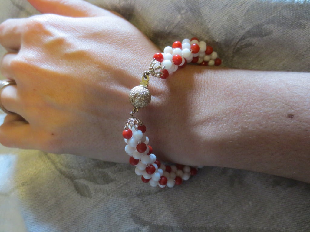 White and Red Coral Bead Woven Rope Bracelet with 14 Karat Gold Sphere Clasp 1