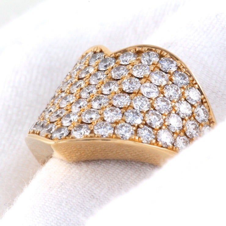 (Retails for $20,100.)

We are LOVING this ring from Chopard. The huge diamond-heart, set in shining 18K yellow gold, is nothing short of spectacular. It's chunky and sexy. And as always with Chopard there are details that make us swoon. Like on