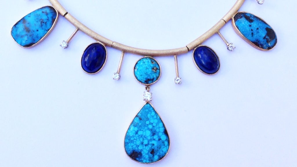 A rare one-off Alexander Kower collar. Signed hand constructed yellow gold segmented item features gem grade Kingman turquoise, Lapis and diamonds (approx. 1ctw G-H VS). Alternating stones complete this mid-century modern/Southwest studio item