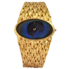 A Magnificent "Peacock" Yellow Gold Watch