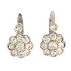 A pair of "Flower" diamond stud earrings