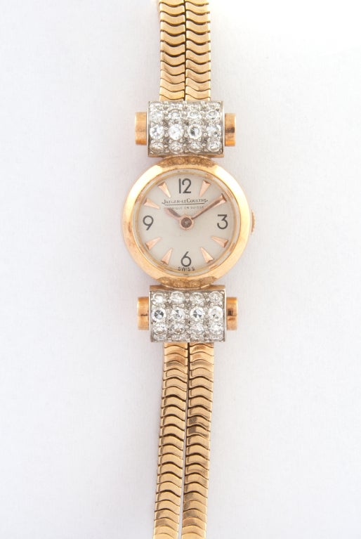 An 18 carats watch signed by Jeager Lecoultre set with 32 round diamonds. Numbered 112395on the case