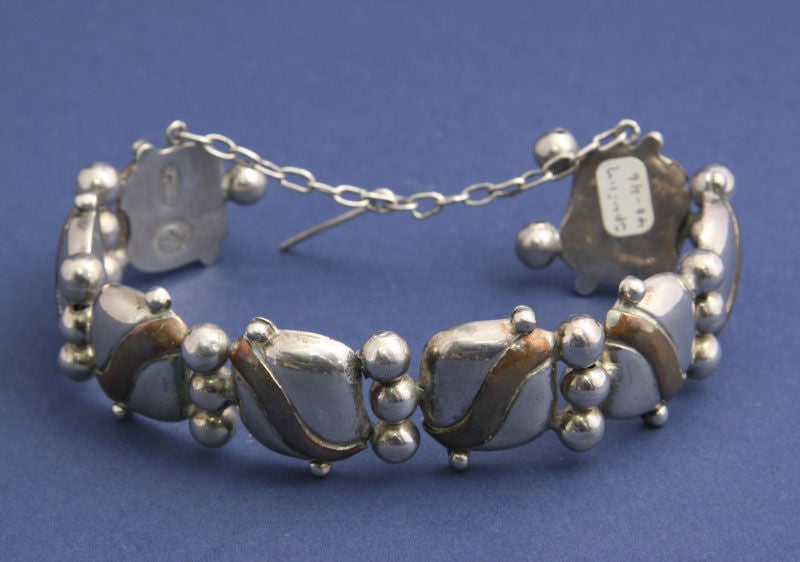 A mixed metal bracelet by master silver designer, William Spratling (1900 - 1967).  Known as the 