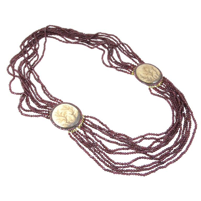 Georgian Gold Clasps with Contemporary Faceted Garnets