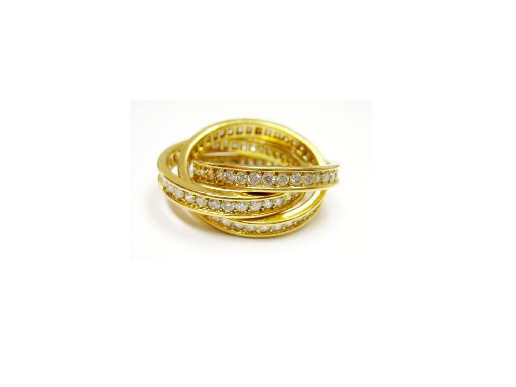 Cartier Yellow Gold & Diamond Rolling Ring.
