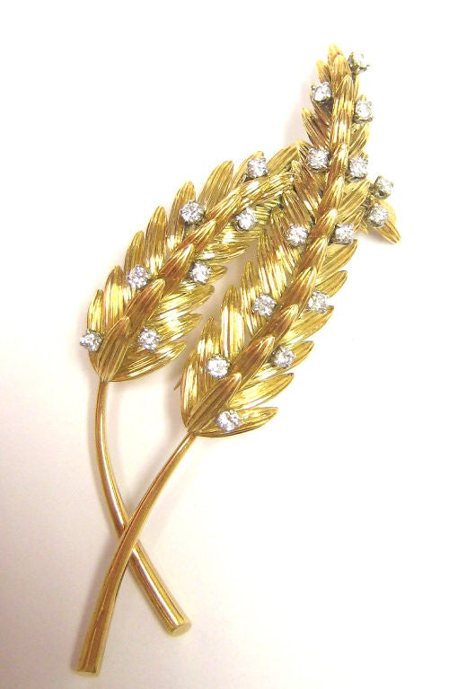 Van Cleef & Arpels Gold & Diamond Double Leaf Brooch.