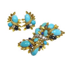 A David Webb Floral Design Brooch and Earrings at 1stDibs