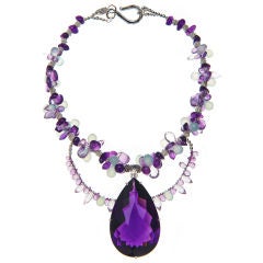 225 carat amethyst pendant with amethyst and chalcedony necklace