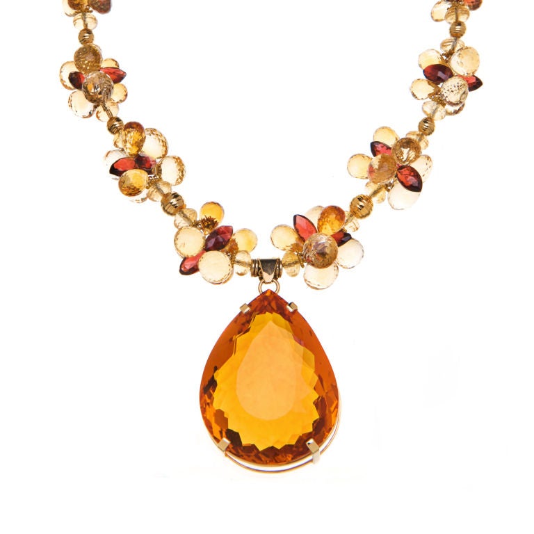 exquisite 259 carat madeira citrine pendant on a necklace of citrine, garnets and 18K gold