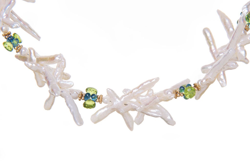 cross pearls, peridot, london topaz and gold necklace