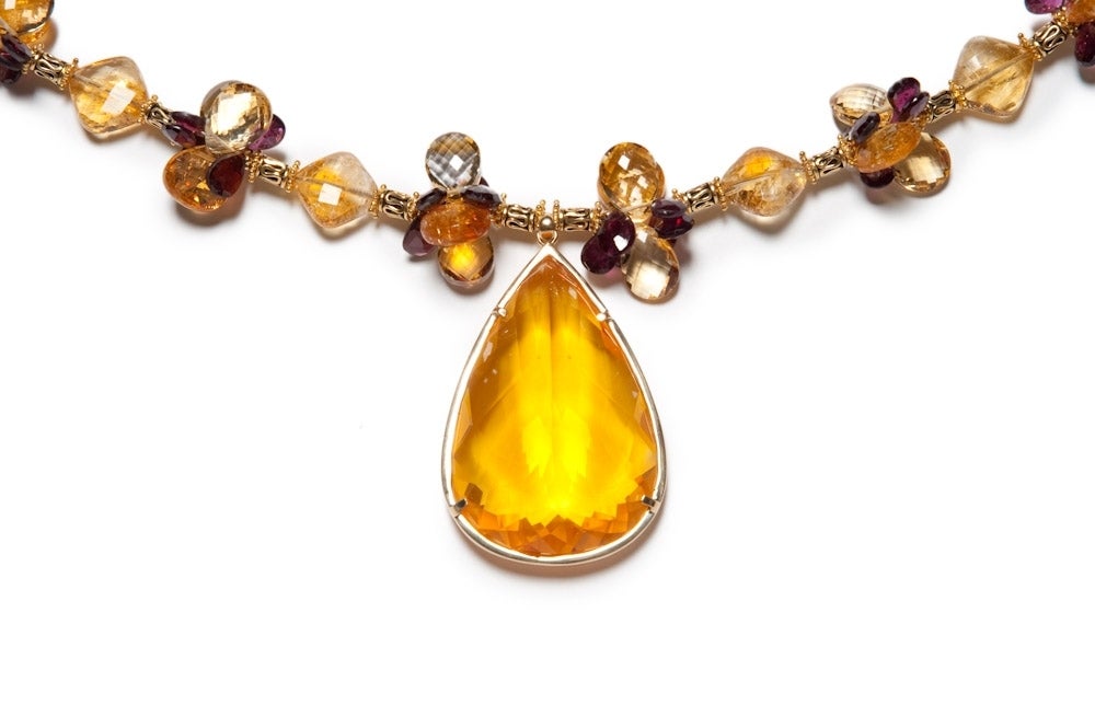 222 Carat Citrine Pendant on a Necklace of Citrine and Garnet in 14K Gold