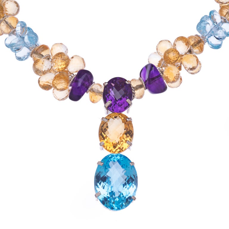 Pendant of 28 Carat Blue Topaz, 11 Carat Citrine and 8 Carat Amethyst on a necklace of Blue Topaz, Citrine and Amethyst in Sterling Silver