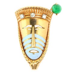 CARTIER. An Enamel Diamond and Emerald Brooch.