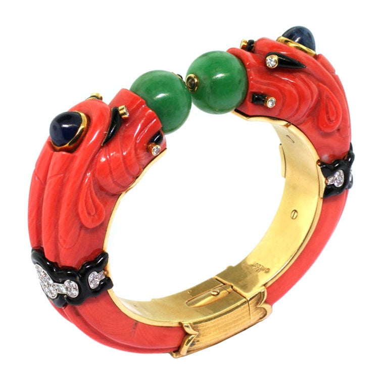 DAVID WEBB. A Gem-set Coral Chimera Bangle For Sale