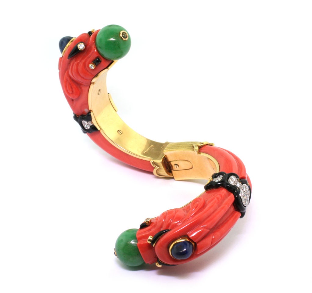 DAVID WEBB. A Gem-set Coral Chimera Bangle For Sale 1