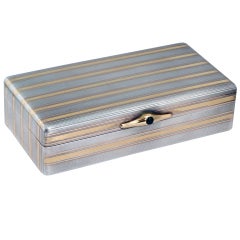 CARTIER. A Gold And Silver Cigar Box