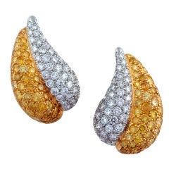 VAN CLEEF 
ARPELS. A Pair Of White and Yellow Diamond Ear Clips.