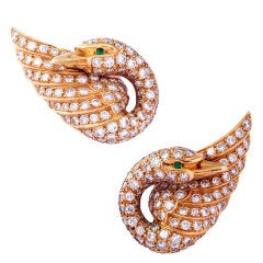 VAN CLEEF & ARPELS. A Pair Of Emerald and Diamond Ear Clips