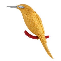 VAN CLEEF & ARPELS. A Yellow Gold, Coral and Diamond Brooch.