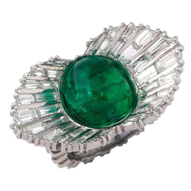 STERLE. An Emerald and Diamond Ring. For Sale