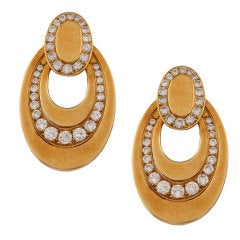 BULGARI. Pair of Yellow Gold and Diamond Ear Clips.