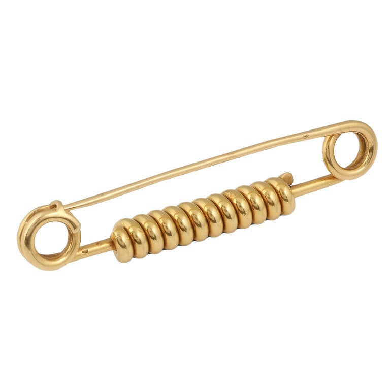 CARTIER. A Yellow Gold 'Safety-Pin' Brooch. For Sale