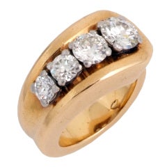 CARTIER. A Yellow Gold and Diamond Ring.