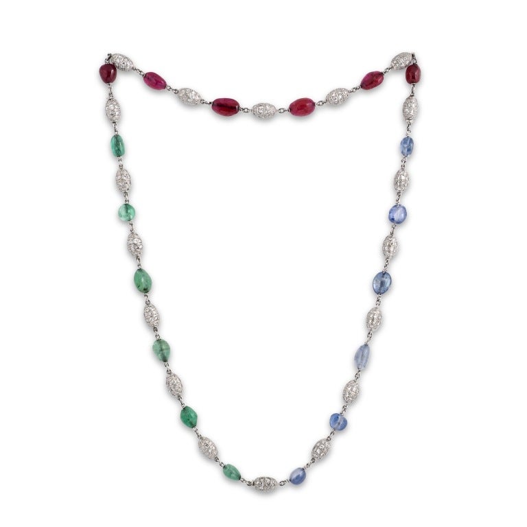 RENE BOIVIN. A Trio of Gem-Set Diamond Bracelets/Necklace.