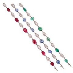 RENE BOIVIN. A Trio of Gem-Set Diamond Bracelets/Necklace.