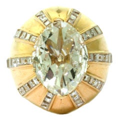 RENE BOIVIN. A Domed Yellow Gold and Diamond Ring.