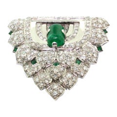 RENE BOIVIN. An Emerald and Diamond Clip Brooch