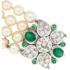 RENE BOIVIN. An Emerald and Diamond Bracelet.