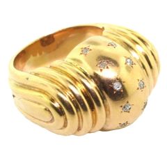 RENE BOIVIN. A yellow gold and diamond ring.