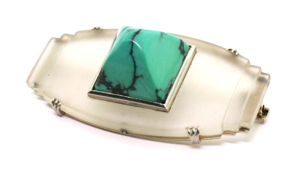 Art Deco GEORGES FOUQUET. A Carved Rock Crystal and Turquoise brooch. For Sale