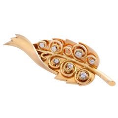 RENE BOIVIN. A Yellow Gold and Diamond Brooch