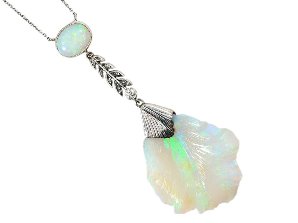 Essence of Elegance: Carved Opal Pendant & Original Box