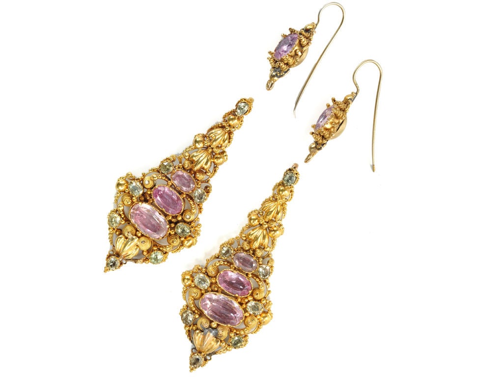 Whether stepping from a horse drawn barouche in Georgian England or from an Aston Martin in 2011, these red carpet-worthy earrings are appropriate for any occasion requiring standout glamour. Fashioned of 15k yellow gold, this form is often referred