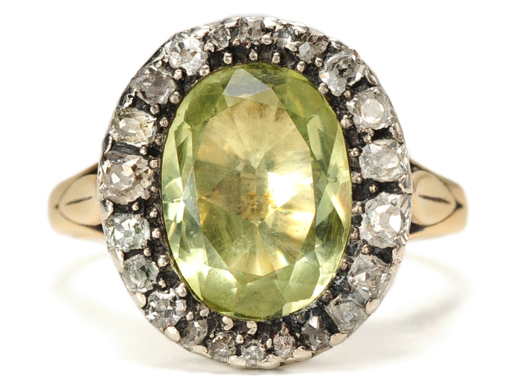 Finger rings were very much a part of the daily wear of a Georgian lady with a few of these Grande Dames wearing a ring on every finger. Here an impressive oval faceted chrysoberyl (13.5 mm by more than 9 mm) is set in the typical closed back and