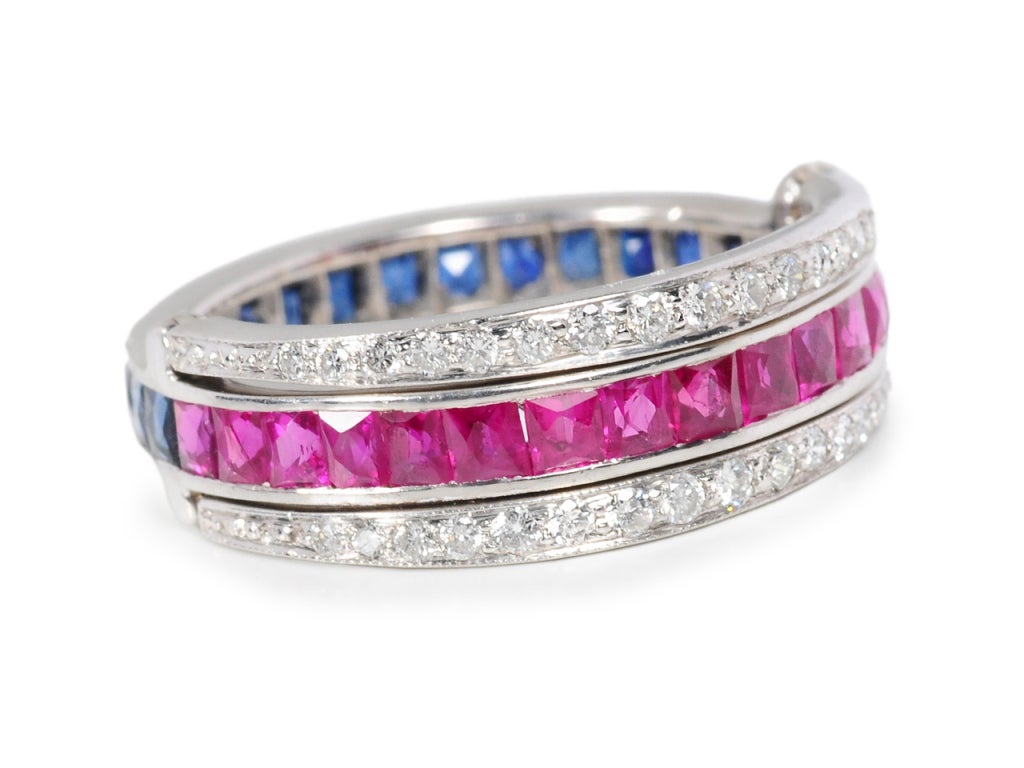 Now you can have the option of wearing a diamond and sapphire or a diamond and ruby set band for the purchase of one ring. The fabricator of this very finely crafted ring took the high road when it comes to craftsmanship. Platinum is the metal of