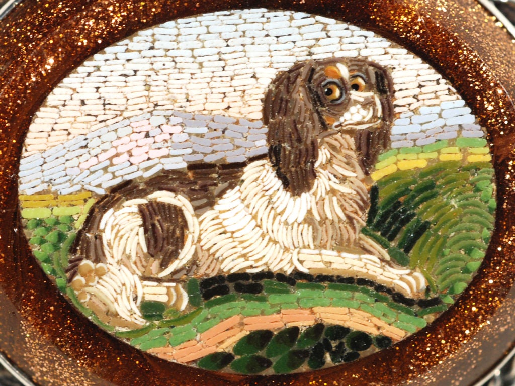 This is just a magnificent example of the Italian art of micro mosaic work. The mosaic displays a recumbent Cavalier King Charles Spaniel, a namesake of King Charles II. This breed has been very much a part of the aristocratic and royal families of