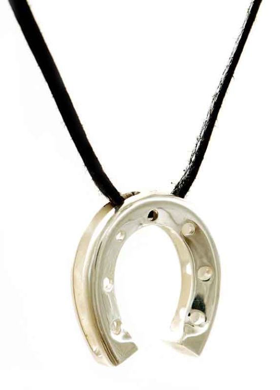 A Silver Peace pendant plated in 18k gold