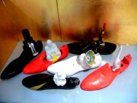 Vintage shoe molds with hand painted deco figurines