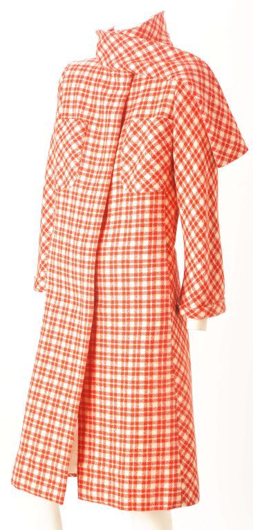 Spring is just around the corner that you are walking to in this happy coat. It has attached self fabric scarf , patch pockets and a hidden button placket. The side panels and sleeves are bias cut ensuring a shapely fit. The sleeves are bracelet and