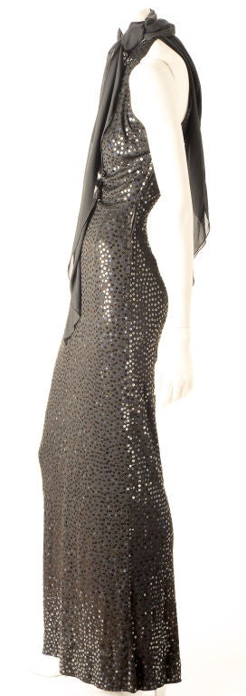 This is it !!! Can you beat it ? Most fabulous and classic Norell evening gown in the all over sequins style that he is most well known for. The original label of Traina-Norell shows that he was doing this look before he formed his own company and