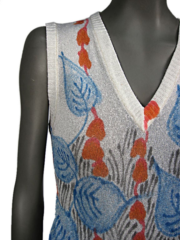 The De Redly atelier in Paris handpainted knits for Christian Dior among other prominent designers of the time. This pullover vest or tank top is a fine gauge,light weight textured rayon knit with rib details.