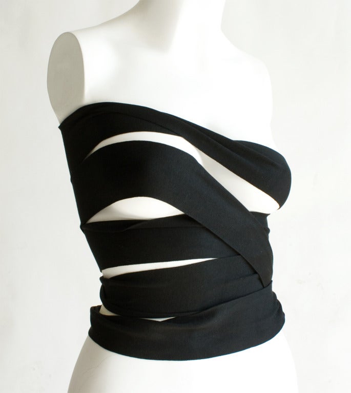 Amazing Yves Saint Laurent Rive Gauche black bandage top with side zip closure. The fabric is a stretchy silk blend. Pictured here on Kate Moss from the Spring 2001 collection. It can also be worn lower on the body as a belt/cummerbund.
