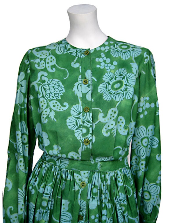 Timeless, cool and and fresh are the simple facts of this long sleeved, button front, cartridge pleated day dress. It is from the 1960's and has a fine department store label: <br />
Julius Garfinkel, Washington D.C.