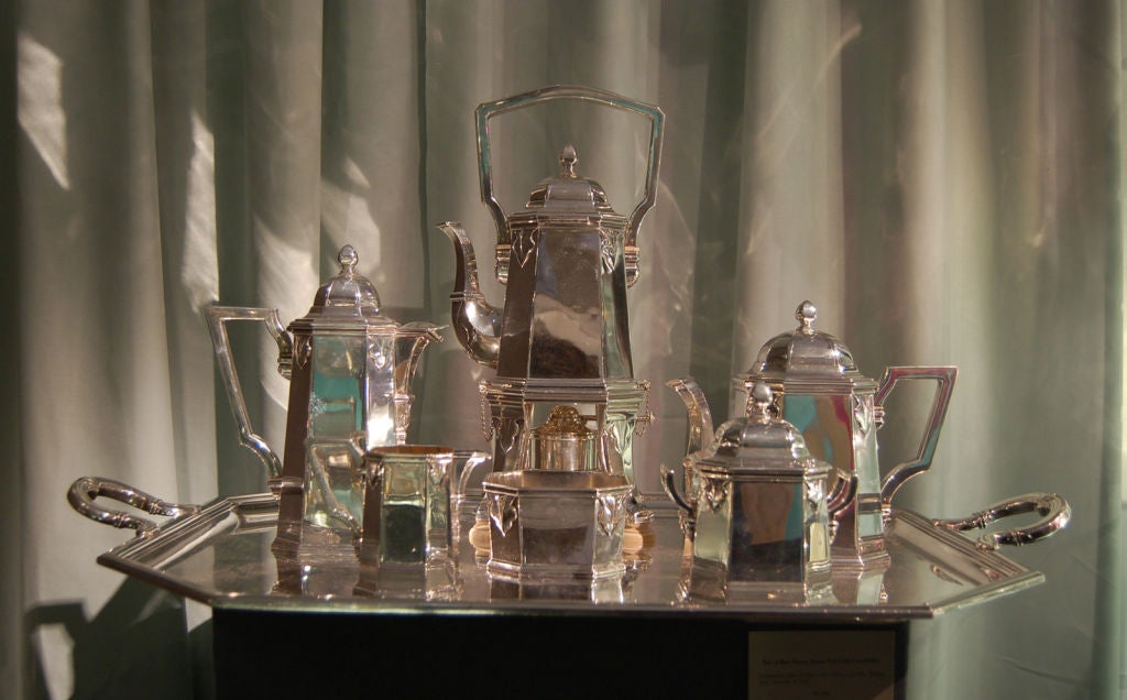This an extraordinary tea and coffee set by Cartier Paris in sterling silver. The dimensions of the tray are 20
