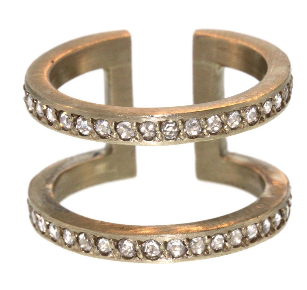 18k white gold and rose cut diamonds make up this modern ring.  1.55ct The height measures 1/2''. Size 6